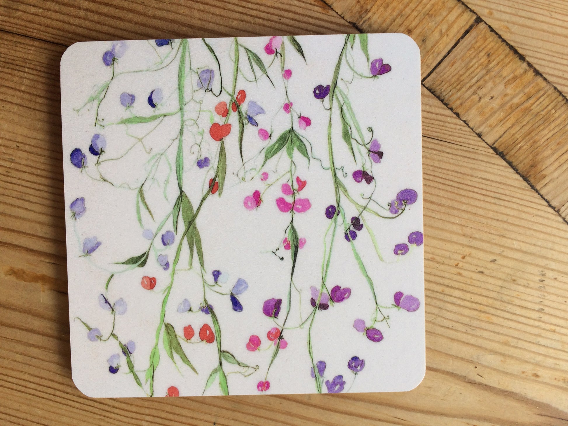 Coaster with unique sweet pea design
